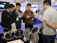 Visitors attend the 14th China International Nanotechnology Industry Expo in Suzhou, China, on October 23, 2024. (