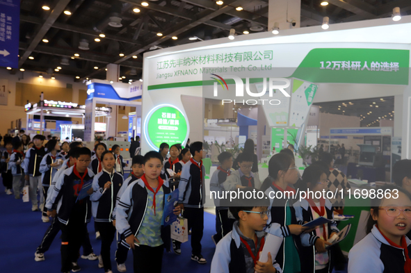 Visitors attend the 14th China International Nanotechnology Industry Expo in Suzhou, China, on October 23, 2024. 