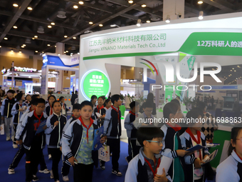 Visitors attend the 14th China International Nanotechnology Industry Expo in Suzhou, China, on October 23, 2024. (