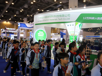 Visitors attend the 14th China International Nanotechnology Industry Expo in Suzhou, China, on October 23, 2024. (