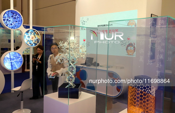 Visitors attend the 14th China International Nanotechnology Industry Expo in Suzhou, China, on October 23, 2024. 