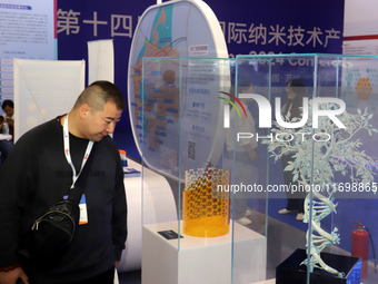 Visitors attend the 14th China International Nanotechnology Industry Expo in Suzhou, China, on October 23, 2024. (