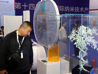 Visitors attend the 14th China International Nanotechnology Industry Expo in Suzhou, China, on October 23, 2024. (