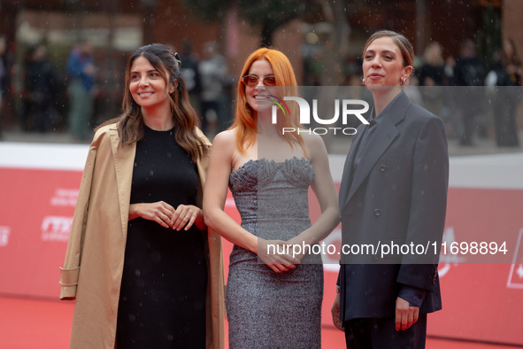 Claudia Potenzam, Noemi, and Barbara Chichiarelli attend the ''Adorazione'' photocall at Casa Alice in Rome, Italy, on October 23, 2024. 