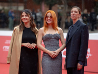 Claudia Potenzam, Noemi, and Barbara Chichiarelli attend the ''Adorazione'' photocall at Casa Alice in Rome, Italy, on October 23, 2024. (