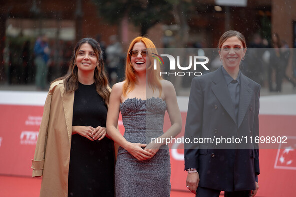 Claudia Potenzam, Noemi, and Barbara Chichiarelli attend the ''Adorazione'' photocall at Casa Alice in Rome, Italy, on October 23, 2024. 