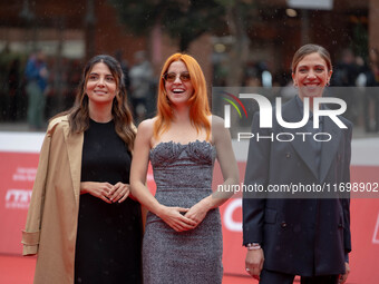 Claudia Potenzam, Noemi, and Barbara Chichiarelli attend the ''Adorazione'' photocall at Casa Alice in Rome, Italy, on October 23, 2024. (