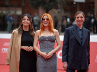 Claudia Potenzam, Noemi, and Barbara Chichiarelli attend the ''Adorazione'' photocall at Casa Alice in Rome, Italy, on October 23, 2024. (