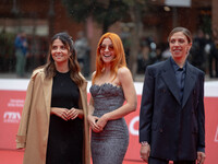 Claudia Potenzam, Noemi, and Barbara Chichiarelli attend the ''Adorazione'' photocall at Casa Alice in Rome, Italy, on October 23, 2024. (