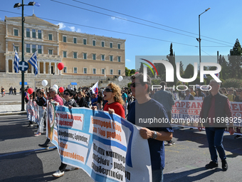 Kindergarten and primary school teachers march in front of the Greek Parliament demanding salary increases in Athens, Greece, on October 23,...