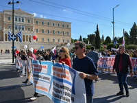 Kindergarten and primary school teachers march in front of the Greek Parliament demanding salary increases in Athens, Greece, on October 23,...