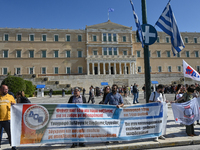 Kindergarten and primary school teachers protest in front of the Greek Parliament demanding salary increases in Athens, Greece, on October 2...