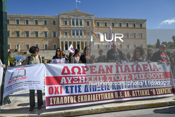 Kindergarten and primary school teachers protest in front of the Greek Parliament demanding salary increases in Athens, Greece, on October 2...