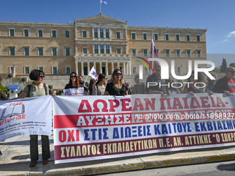 Kindergarten and primary school teachers protest in front of the Greek Parliament demanding salary increases in Athens, Greece, on October 2...