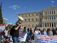 Kindergarten and primary school teachers protest in front of the Greek Parliament demanding salary increases in Athens, Greece, on October 2...