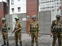 Bangladesh army soldiers stand guard in front of the Secretariat as HSC (Higher Secondary Certificate) students, who fail or receive poor re...