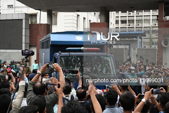 Prison vans transport students after police detain over 50 students for questioning from the Secretariat in Dhaka, Bangladesh, on October 23...