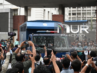 Prison vans transport students after police detain over 50 students for questioning from the Secretariat in Dhaka, Bangladesh, on October 23...