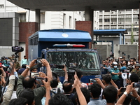 Prison vans transport students after police detain over 50 students for questioning from the Secretariat in Dhaka, Bangladesh, on October 23...