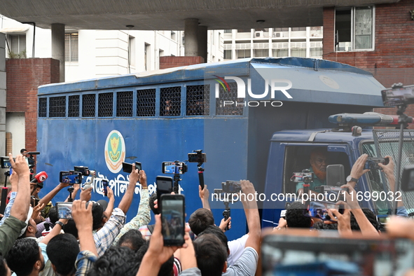 Prison vans transport students after police detain over 50 students for questioning from the Secretariat in Dhaka, Bangladesh, on October 23...