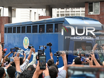 Prison vans transport students after police detain over 50 students for questioning from the Secretariat in Dhaka, Bangladesh, on October 23...