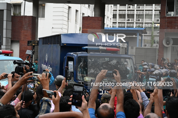 Prison vans transport students after police detain over 50 students for questioning from the Secretariat in Dhaka, Bangladesh, on October 23...