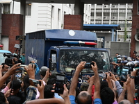 Prison vans transport students after police detain over 50 students for questioning from the Secretariat in Dhaka, Bangladesh, on October 23...