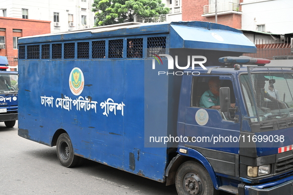 Prison vans transport students after police detain over 50 students for questioning from the Secretariat in Dhaka, Bangladesh, on October 23...