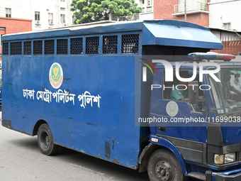 Prison vans transport students after police detain over 50 students for questioning from the Secretariat in Dhaka, Bangladesh, on October 23...