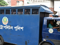 Prison vans transport students after police detain over 50 students for questioning from the Secretariat in Dhaka, Bangladesh, on October 23...