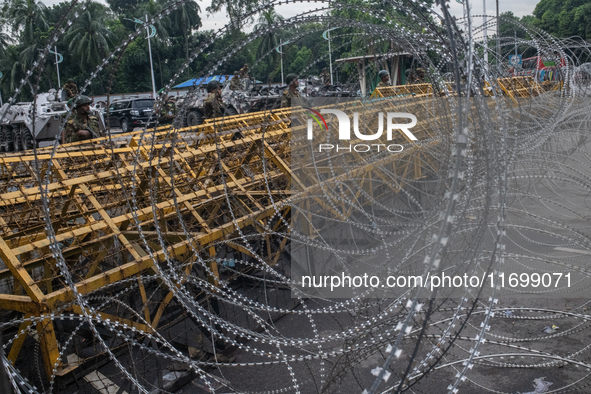 Security is tightened around the Bangabhaban premises as protests for the president's resignation continue in Dhaka, Bangladesh, on October...