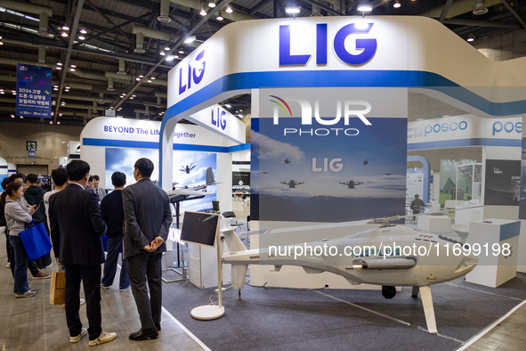 Visitors gather around the LIG booth at 'RoboWorld 2024' in KINTEX, Goyang, South Korea, on October 23, 2024, where the company showcases it...