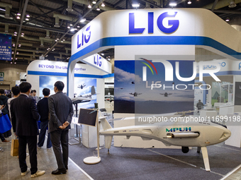 Visitors gather around the LIG booth at 'RoboWorld 2024' in KINTEX, Goyang, South Korea, on October 23, 2024, where the company showcases it...