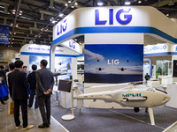 Visitors gather around the LIG booth at 'RoboWorld 2024' in KINTEX, Goyang, South Korea, on October 23, 2024, where the company showcases it...