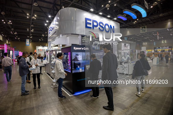 Visitors explore the Epson booth at 'RobotWorld 2024' in KINTEX, Goyang, South Korea, where the company showcases its latest robotics and au...