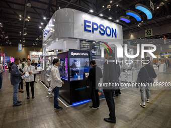 Visitors explore the Epson booth at 'RobotWorld 2024' in KINTEX, Goyang, South Korea, where the company showcases its latest robotics and au...