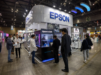 Visitors explore the Epson booth at 'RobotWorld 2024' in KINTEX, Goyang, South Korea, where the company showcases its latest robotics and au...