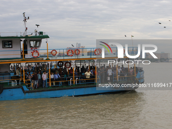 A passenger ferry sails along the river Hooghly in Kolkata, India, on October 23, 2024. (