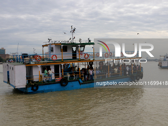 A passenger ferry sails along the river Hooghly in Kolkata, India, on October 23, 2024. (