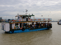 A passenger ferry sails along the river Hooghly in Kolkata, India, on October 23, 2024. (