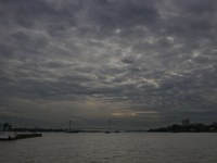 Dark clouds loom over the sky due to Cyclone Dana in India on October 23, 2024. The IMD predicts on Wednesday that the storm brings heavy ra...