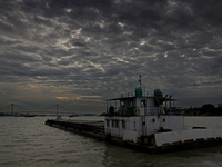 Dark clouds loom over the sky due to Cyclone Dana in India on October 23, 2024. The IMD predicts on Wednesday that the storm brings heavy ra...