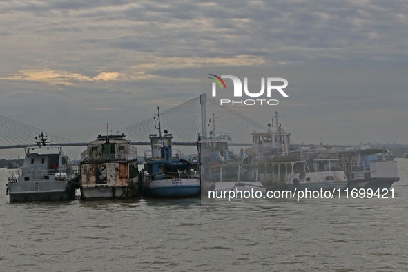 Boats park on the Hooghly River due to Cyclone Dana in Kolkata, India, on October 23, 2024. 