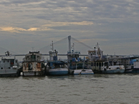 Boats park on the Hooghly River due to Cyclone Dana in Kolkata, India, on October 23, 2024. (