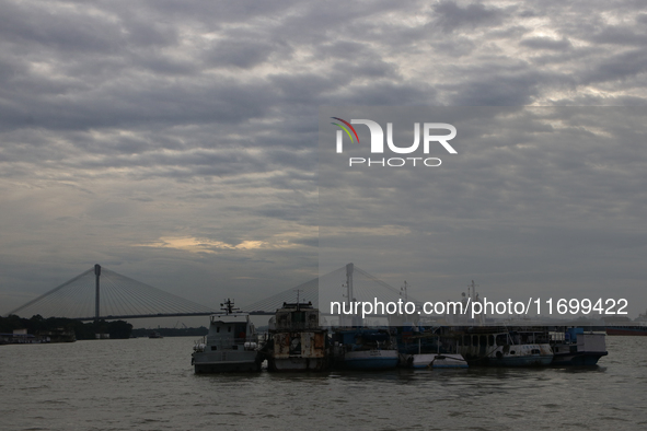 Boats park on the Hooghly River due to Cyclone Dana in Kolkata, India, on October 23, 2024. 