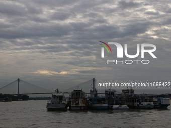 Boats park on the Hooghly River due to Cyclone Dana in Kolkata, India, on October 23, 2024. (