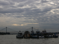 Boats park on the Hooghly River due to Cyclone Dana in Kolkata, India, on October 23, 2024. (