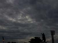 Dark clouds loom over the sky due to Cyclone Dana in India on October 23, 2024. The IMD predicts on Wednesday that the storm brings heavy ra...