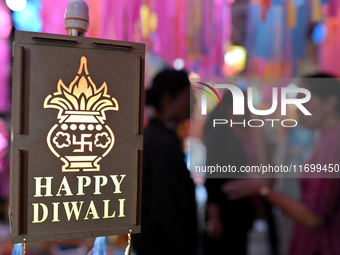 People shop for lanterns at a market ahead of the Hindu festival of Diwali in Mumbai, India, on October 23, 2024. (