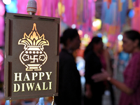 People shop for lanterns at a market ahead of the Hindu festival of Diwali in Mumbai, India, on October 23, 2024. (